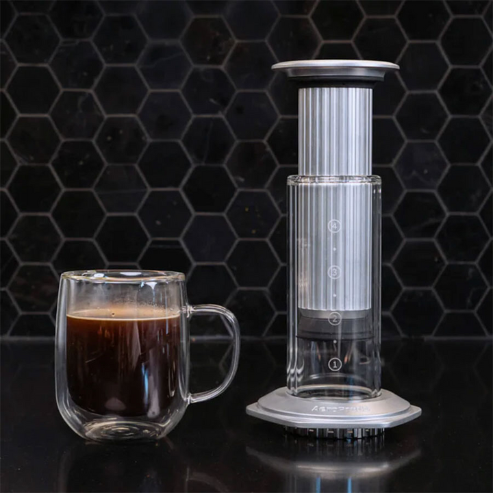 AeroPress Premium Coffee Maker made of glass and stainless steel – a handcrafted masterpiece - Coffee Coaching Club