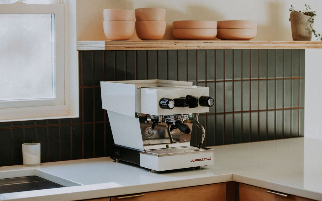 La Marzocco Linea Micra in white – lifestyle shot in a modern kitchen – Coffee Coaching Club
