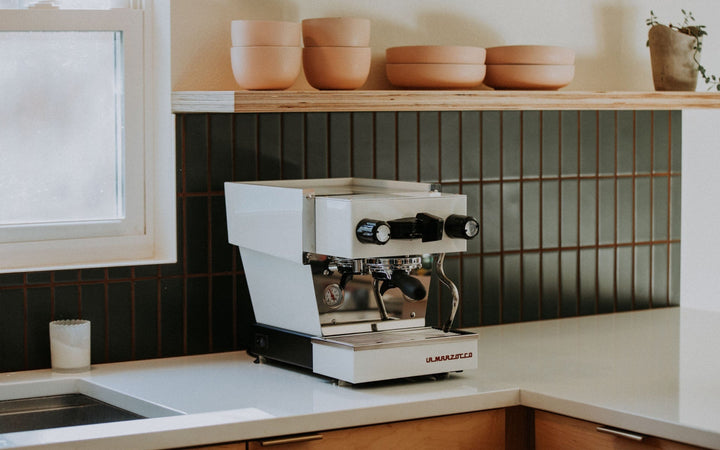 La Marzocco Linea Micra in white – lifestyle shot in a modern kitchen – Coffee Coaching Club